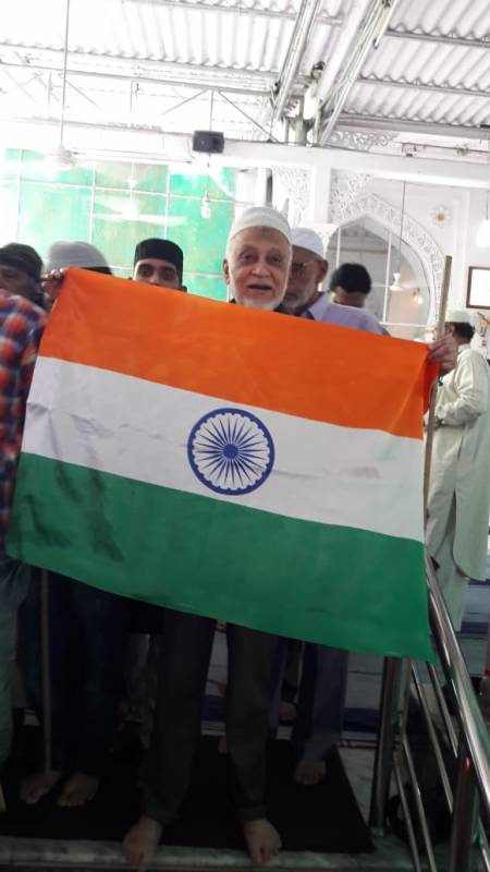 National flags distributed after Jumma prayers at Hyderabad mosque