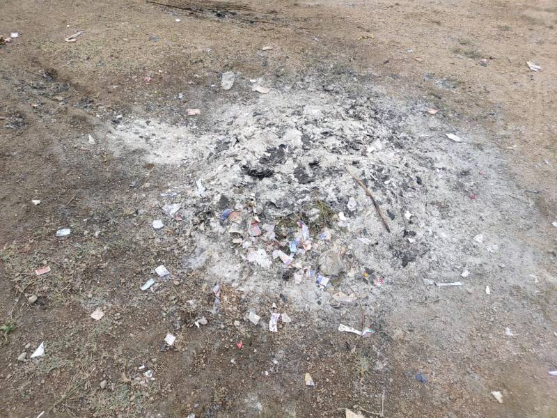 Postal departments undelivered mails found burnt in disputed open plot Postal departments undelivered mails found burnt in disputed open plot