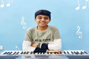 Hyderabad boy attempts to set musical record, plays 20 songs blindfolded Hyderabad boy attempts to set musical record, plays 20 songs blindfolded