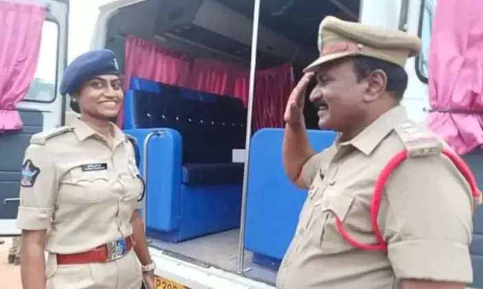 Proud moment: A police inspector salutes his DSP daughter at Tirupati