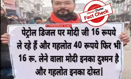 Fact check: Viral image of a man holding placard about fuel prices is morphed