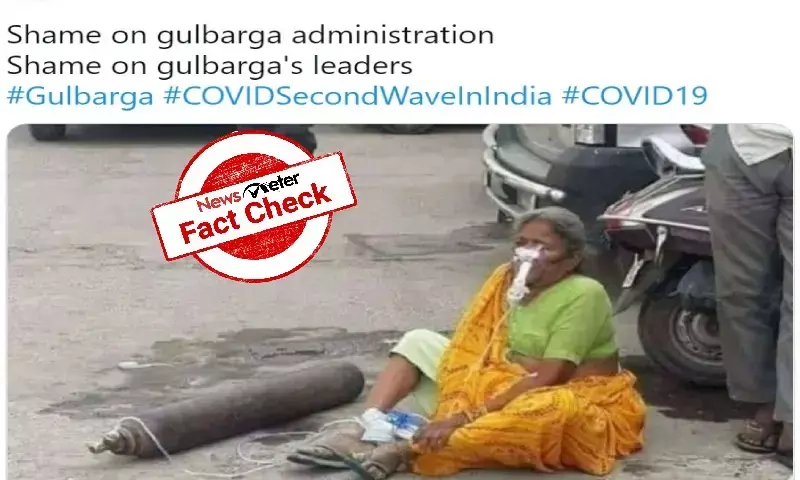 woman with oxygen cylinder