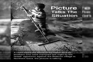 Photograph of Palestinian child wiping fathers blood dates back to 2012 Photograph of Palestinian child wiping fathers blood dates back to 2012
