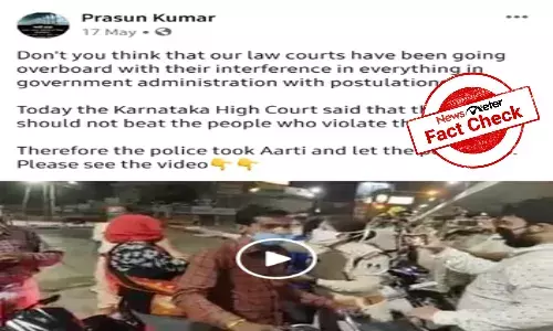 Cops performing `aarti of  lockdown violators are from MP, not Karnataka