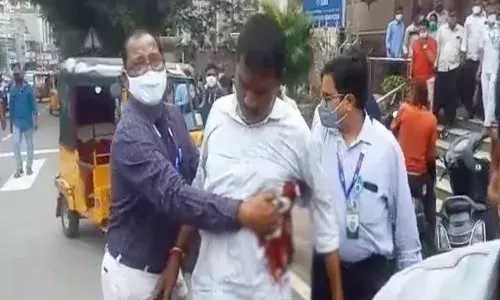 Security guard fires at SBI employee at Gunfoundry branch; detained