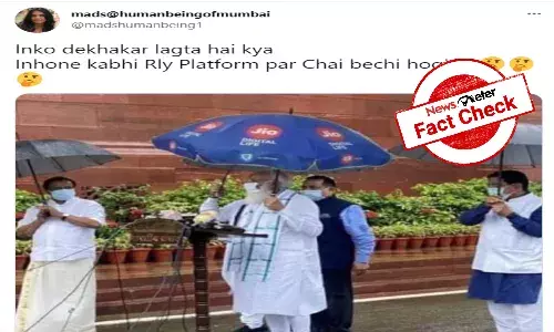 Fact Check: Morphed image of PM carrying umbrella with Jio logo goes viral