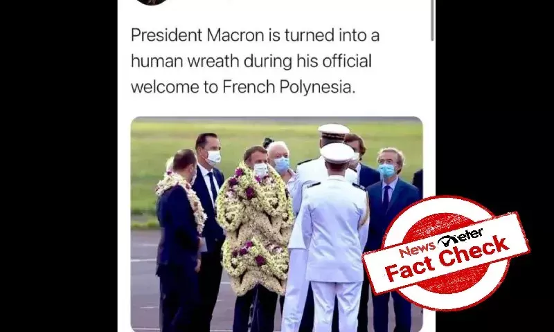 Viral image of heavily garlanded French President Macron is morphed