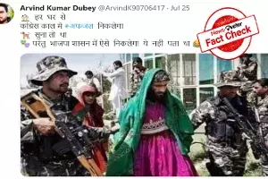 Fact Check: Old image of terrorist dressed as woman is from Afghanistan, not India Fact Check: Old image of terrorist dressed as woman is from Afghanistan, not India