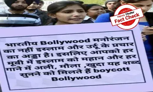 Did a girl hold a Boycott Bollywood placard during a protest demonstration?
