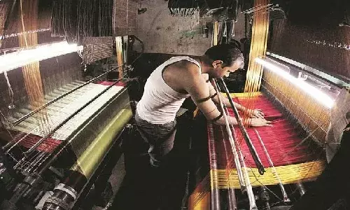 `Ensure monthly income of Rs. 15000: Telangana government releases Rs 73 crore for handloom weavers