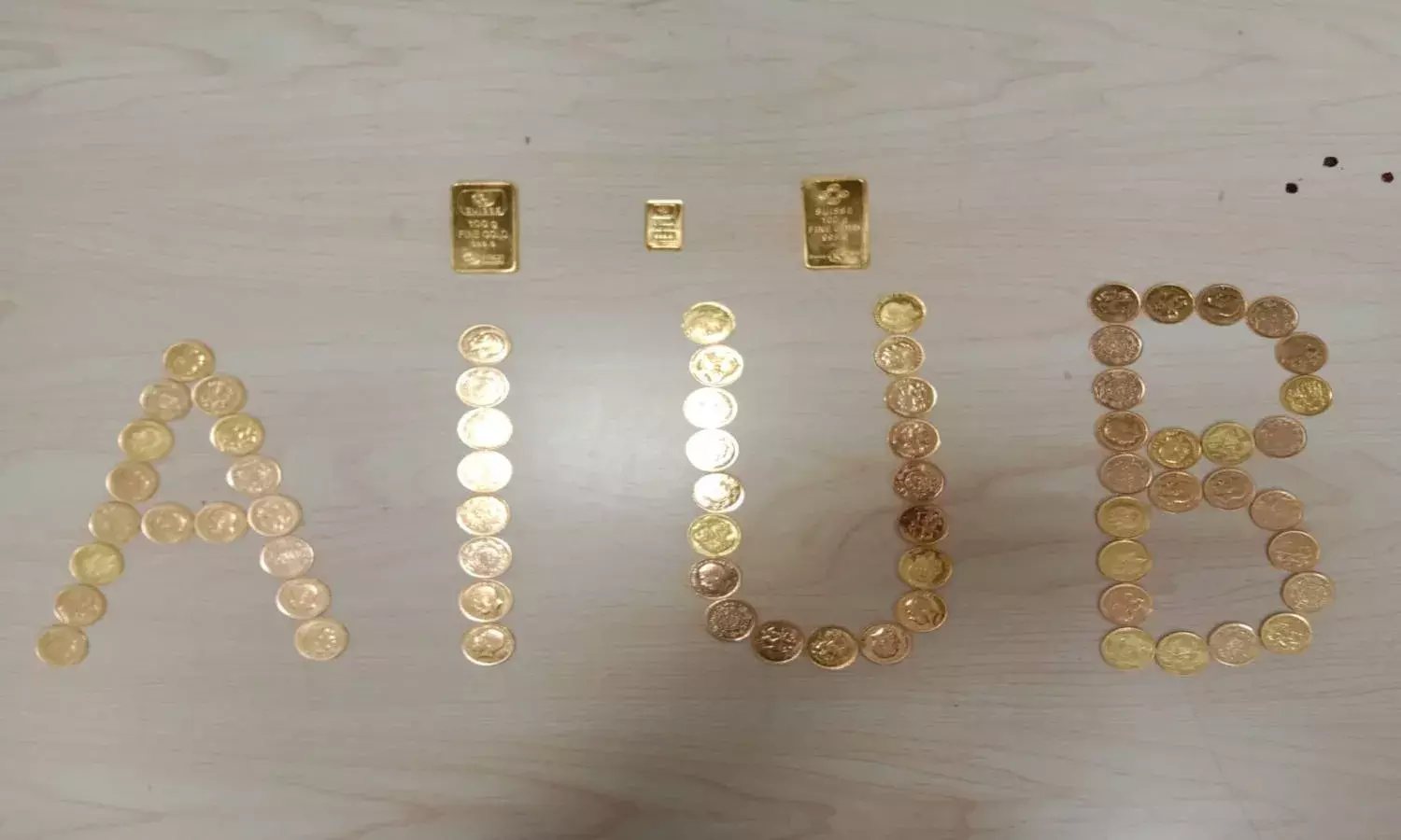 Man held at RGIA with gold worth Rs. 34L concealed in chocolate boxes