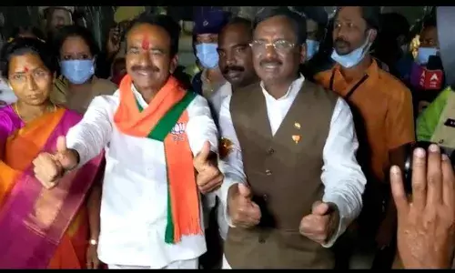 Nampally BJP office echoes with cheers, crackers after Huzurabad victory