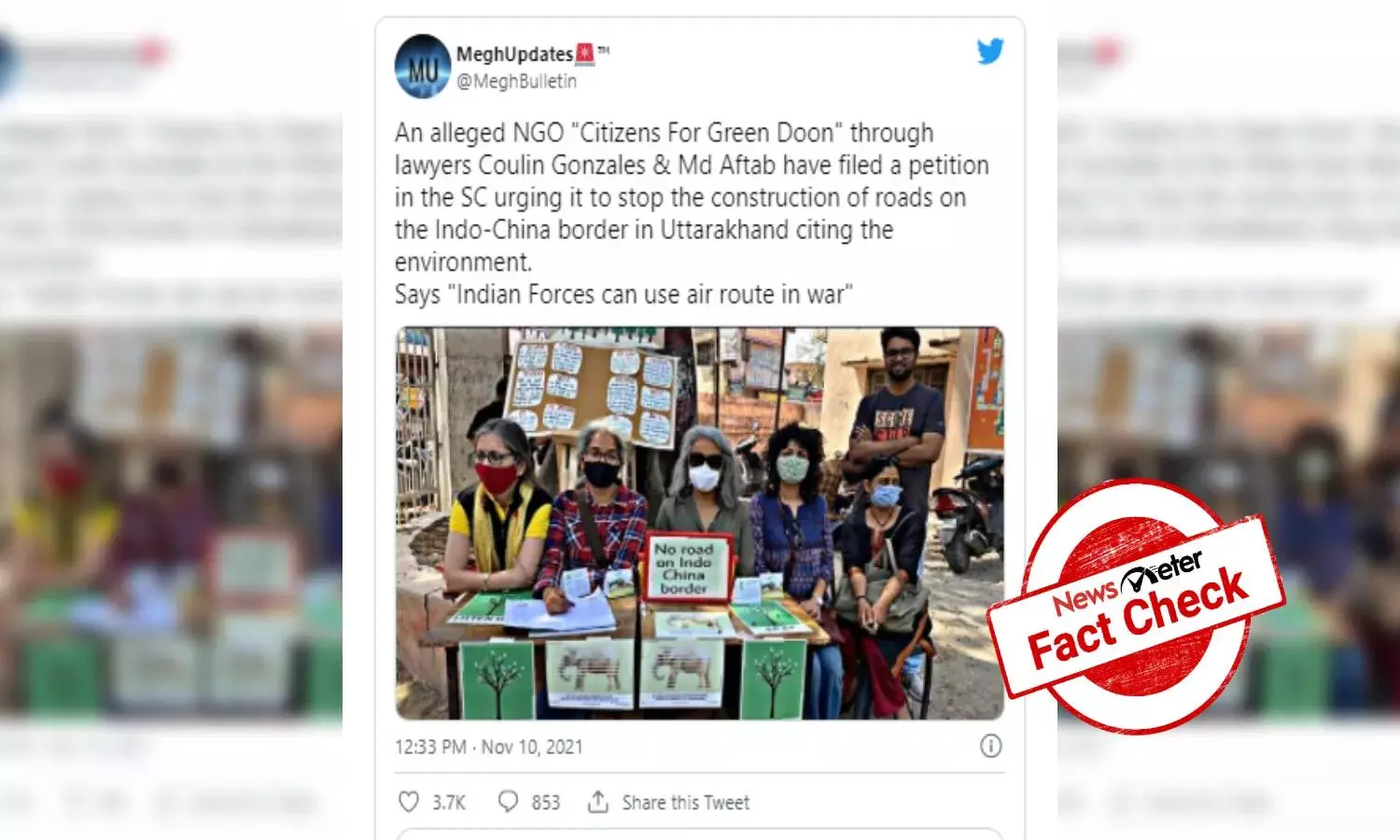 Fact Check: Morphed photo shows group of people holding No road on Indo-China border placard
