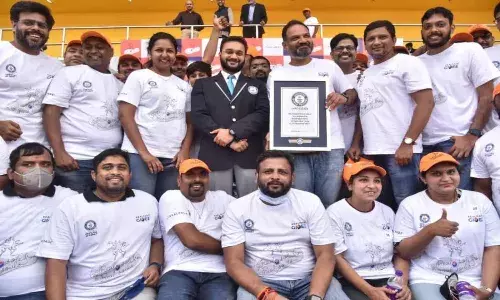 RealSoles from RealSouls: RealPage sets Guinness Records, distributes 30,107 pairs of shoes among TS students