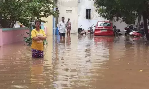 Bridge, railway track, highway damaged in AP flash floods; normal life disrupted