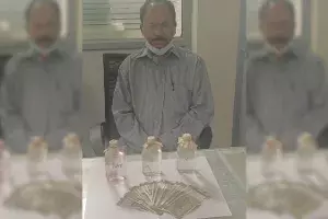 Medipally sub-inspector caught red-handed accepting bribe Medipally sub-inspector caught red-handed accepting bribe