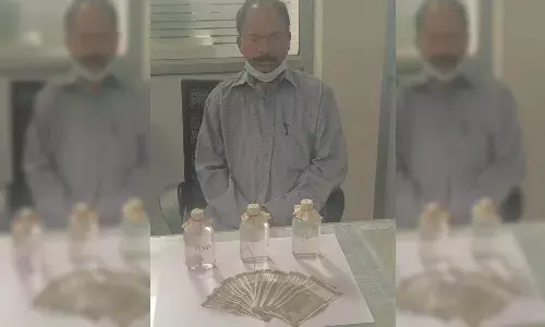 Medipally sub-inspector caught red-handed accepting bribe