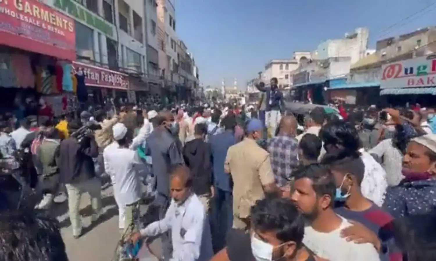 AIMIM members launch protest in Charminar against attack on Owaisi
