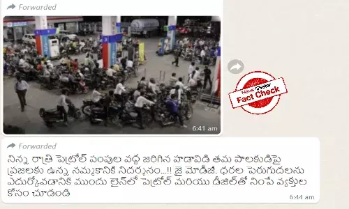 Old image of queue at filling station passed off as rush before fuel price hike