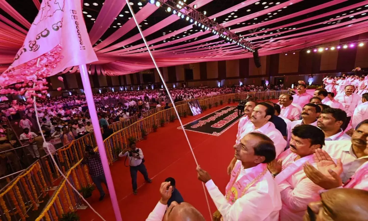 TRS plenary: Party supporters paint Hyderabad pink