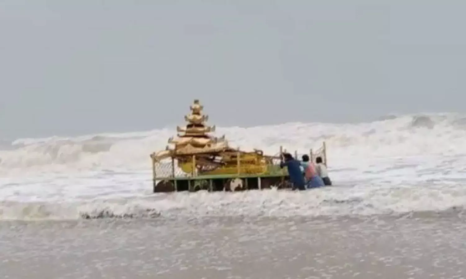 Cyclone Asani: Strong waves push golden-colored chariot ashore in Srikakulam