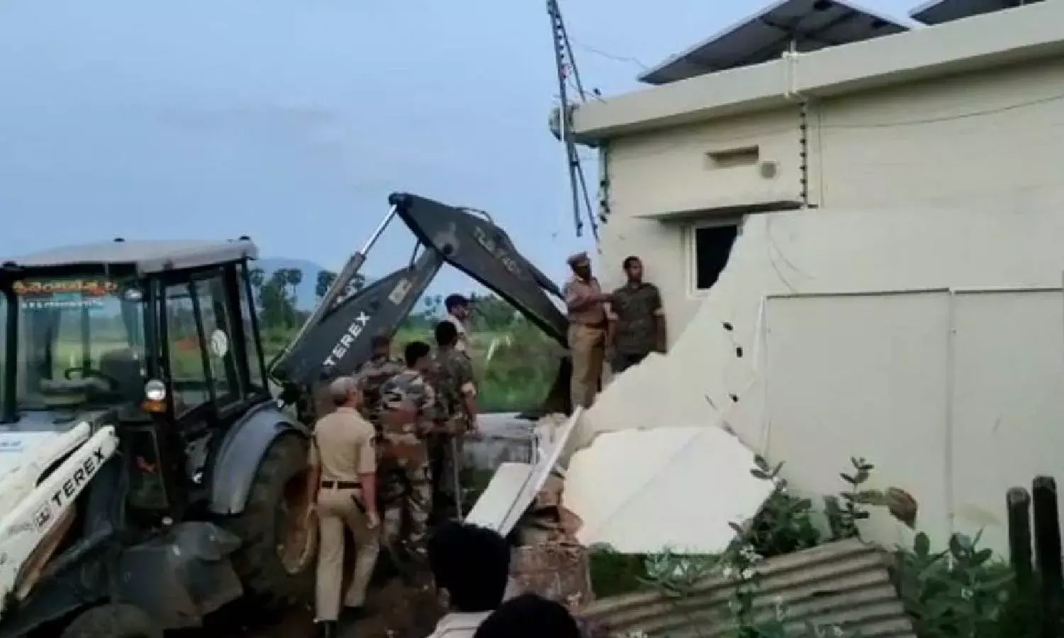 Tension in Narsipatnam after municipality demolish ex-minister Ayyanna Patrudus house wall