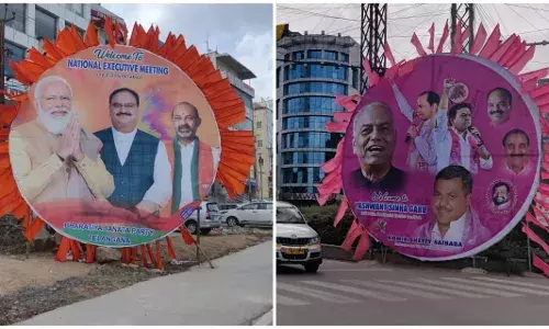 A hoarding war between TRS and BJP