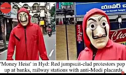 Red jumpsuit-clad protestors pop up at banks, railway stations with anti-Modi placards
