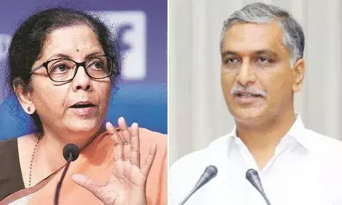 Ridiculous to have photo of PM at ration shops: TS finance minister