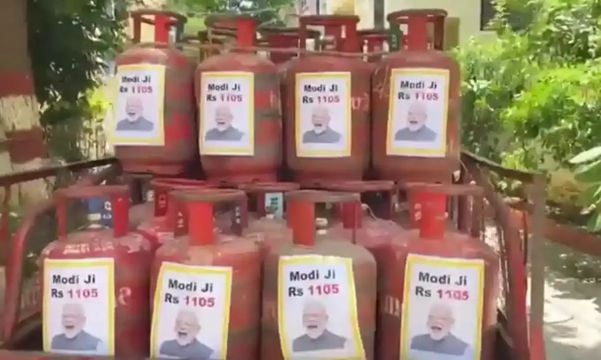 You wanted photos of Modi, here you are: TRS puts PMs photos on LPG cylinders