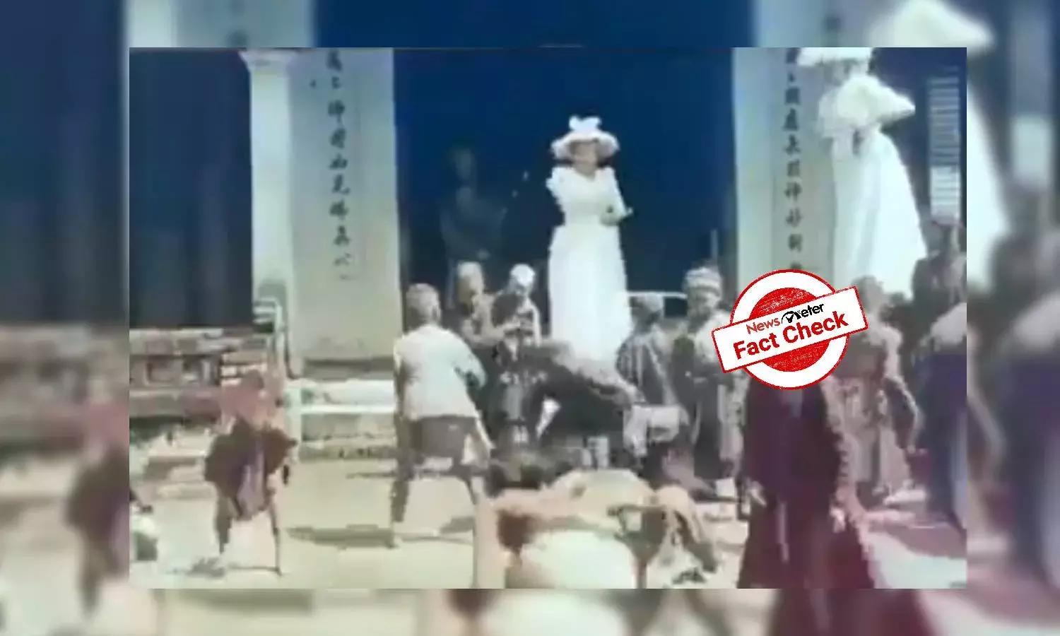 Woman in viral video tossing money at children is not Queen Elizabeth II