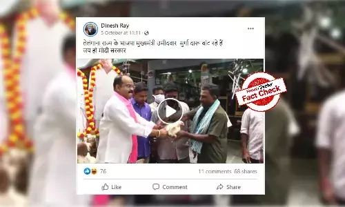 TRS leader distributing liquor passed off as BJP CM candidate