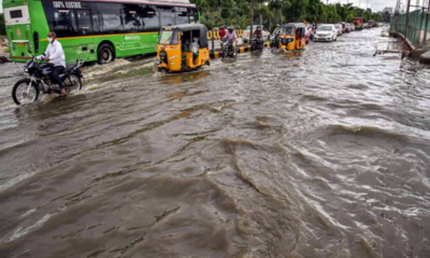 hyderabad-rains-life-paralyzed-roads-flooded-motorbikes-washed-away