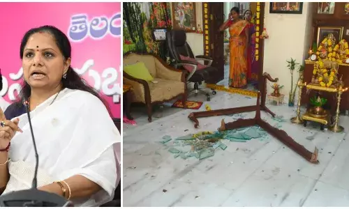BJPs Arvind Dharmapuris house vandalised, Kavitha threatens to hit him chappals