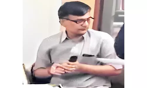 Top GST officer Bollineni Srinivasa Gandhi suspension extended again