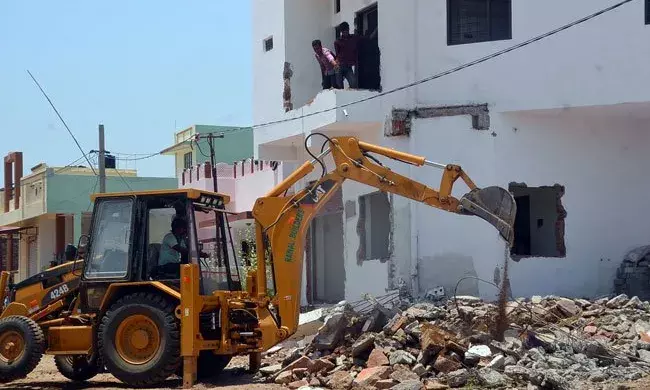Why is state eager to regularize illegal constructions? TS HC tears into govt