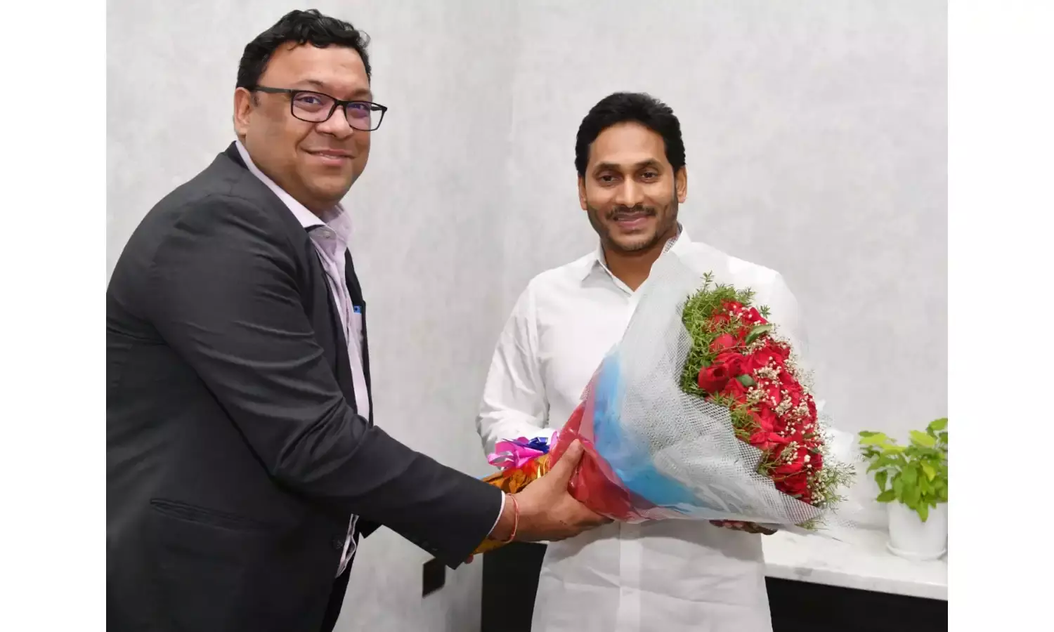 From the left, Triveni Glass Limited MD Varun Gupta and AP chief minister Y S Jagan Mohan Reddy