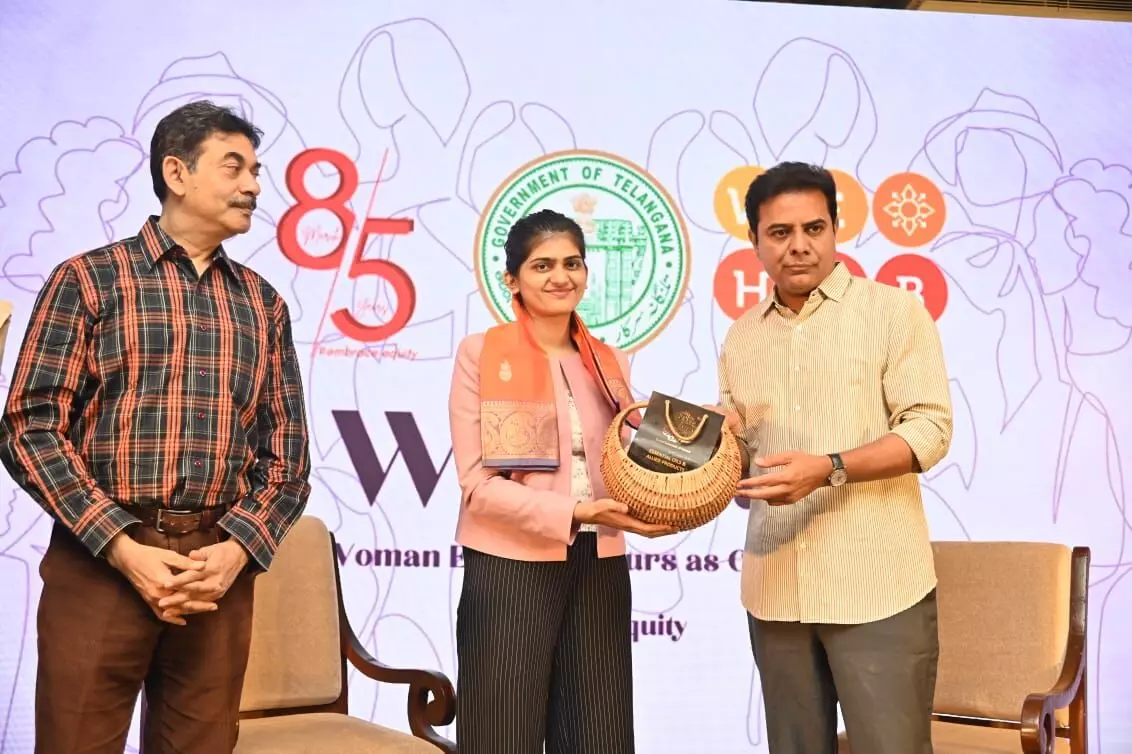 IT Minister KTR felicitating the young entrepreneur in Hyderabad