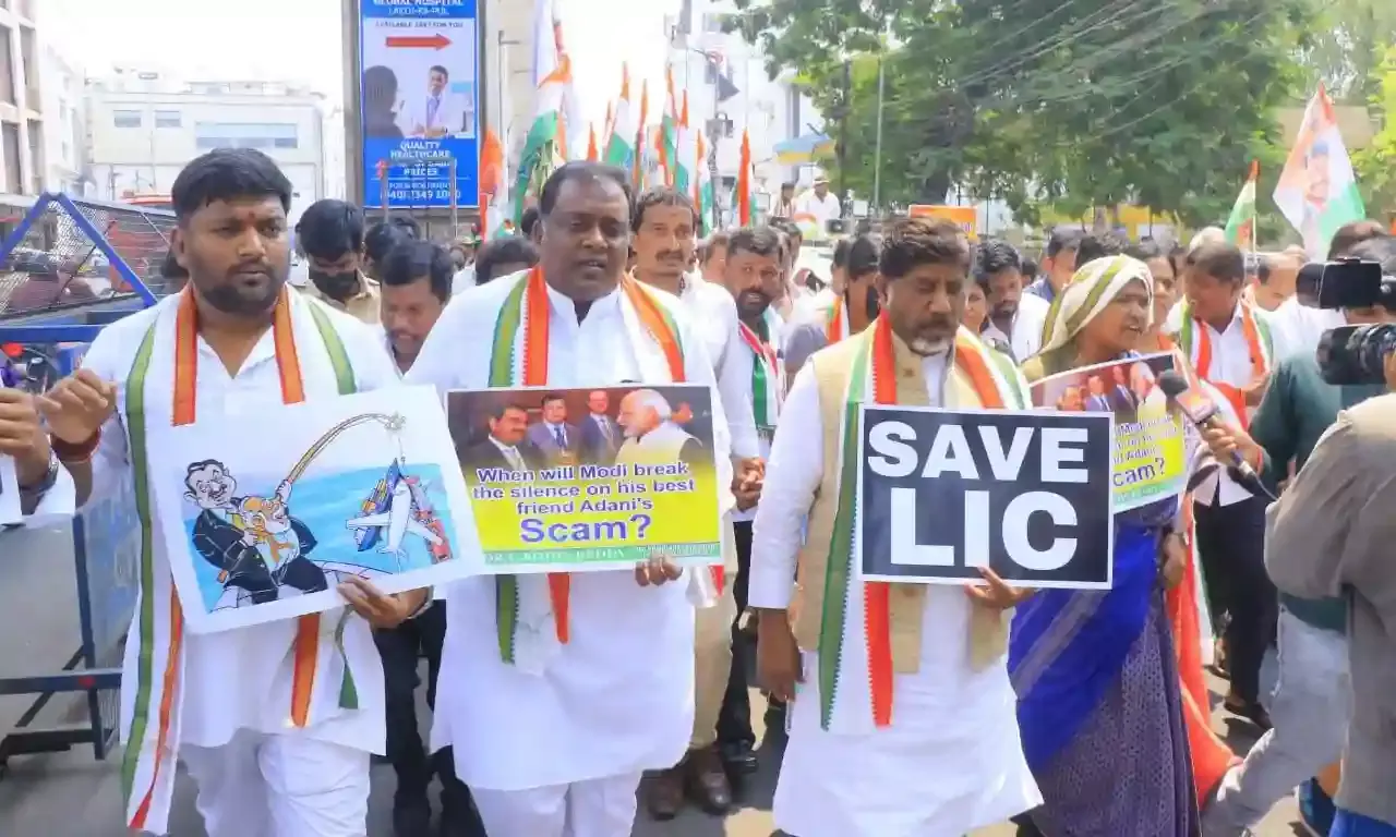 Telangana Congress leaders protest, demand probe against Adani Group