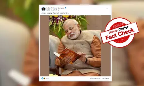 Congress shares morphed image of PM Modi reading ‘101 Ways To Save Adani’
