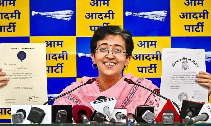 Delhi Education Minister Atishi presenting her degree certificates