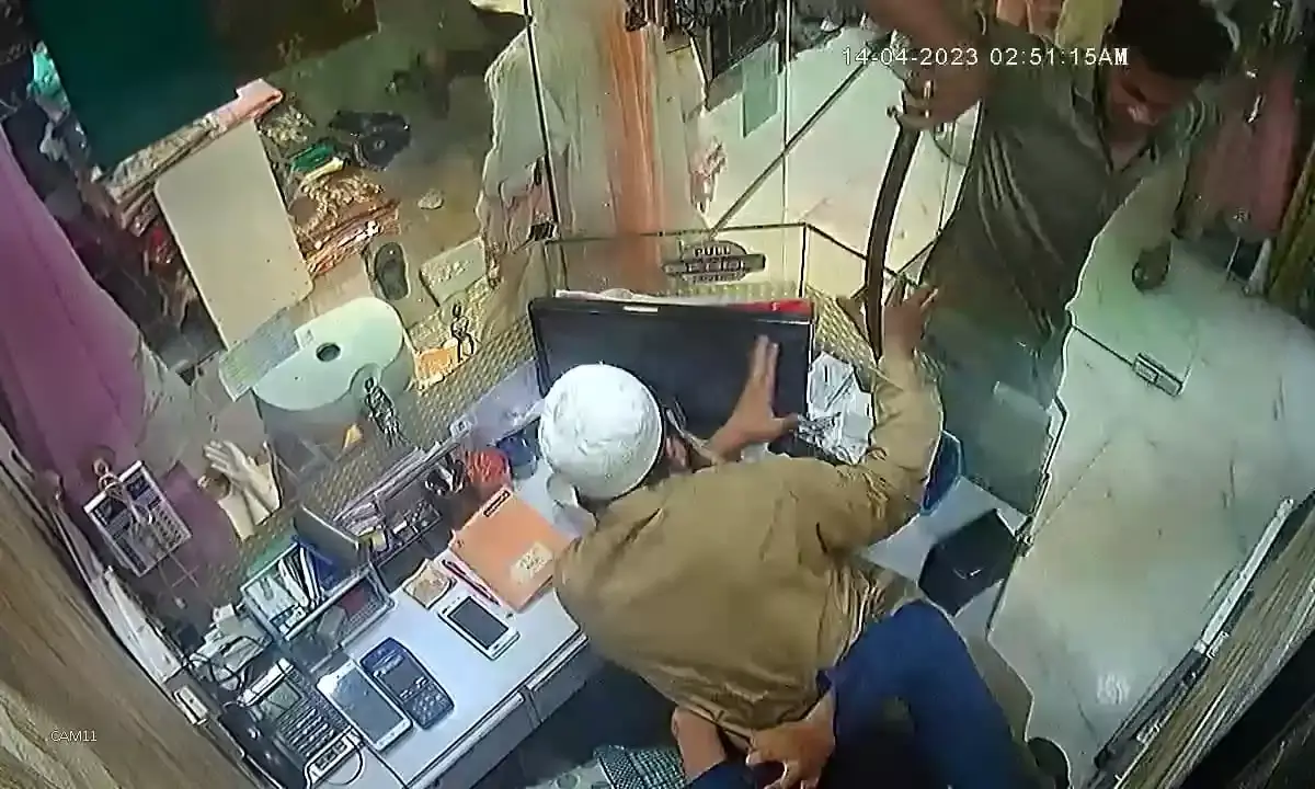 Two held for attacking shopkeeper with swords