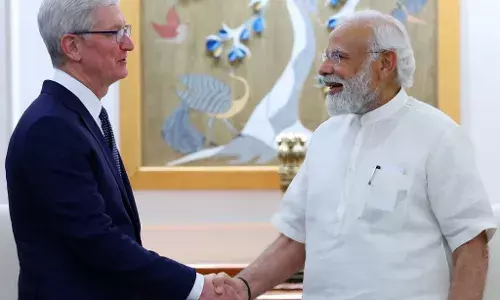 Tim Cook and Narendra Modi