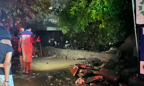 the wall collapsed due to the pressure caused by the rainwater passing from the main road to the lower road.