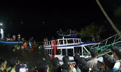 houseboat with more than 30 passengers on board capsized and sank near the Thoovaltheeram beach