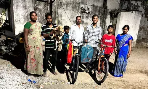 Nacharam boys wade through floodwaters to save puppy