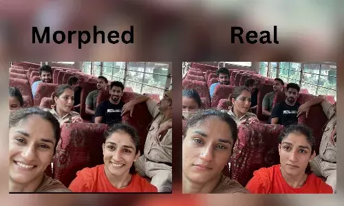 Morphed photo shows wrestlers smiling after being detained by police