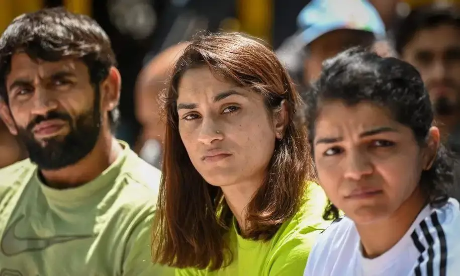 Hours after wrestlers call off move to immerse medals in Ganga, United World Wrestlers threatens to suspend WFI.