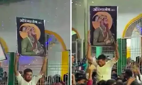 posters of Aurangzeb in a rally
