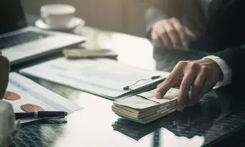 Visakhapatnam: CDAās  senior auditor, data entry operator caught red-handed accepting bribe.